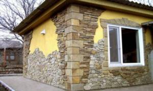 Отделка фасада дома искусственным камнем