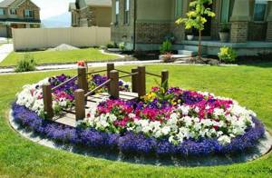 Привлекательный дизайн цветников возле дома: Советы по размещению клумб